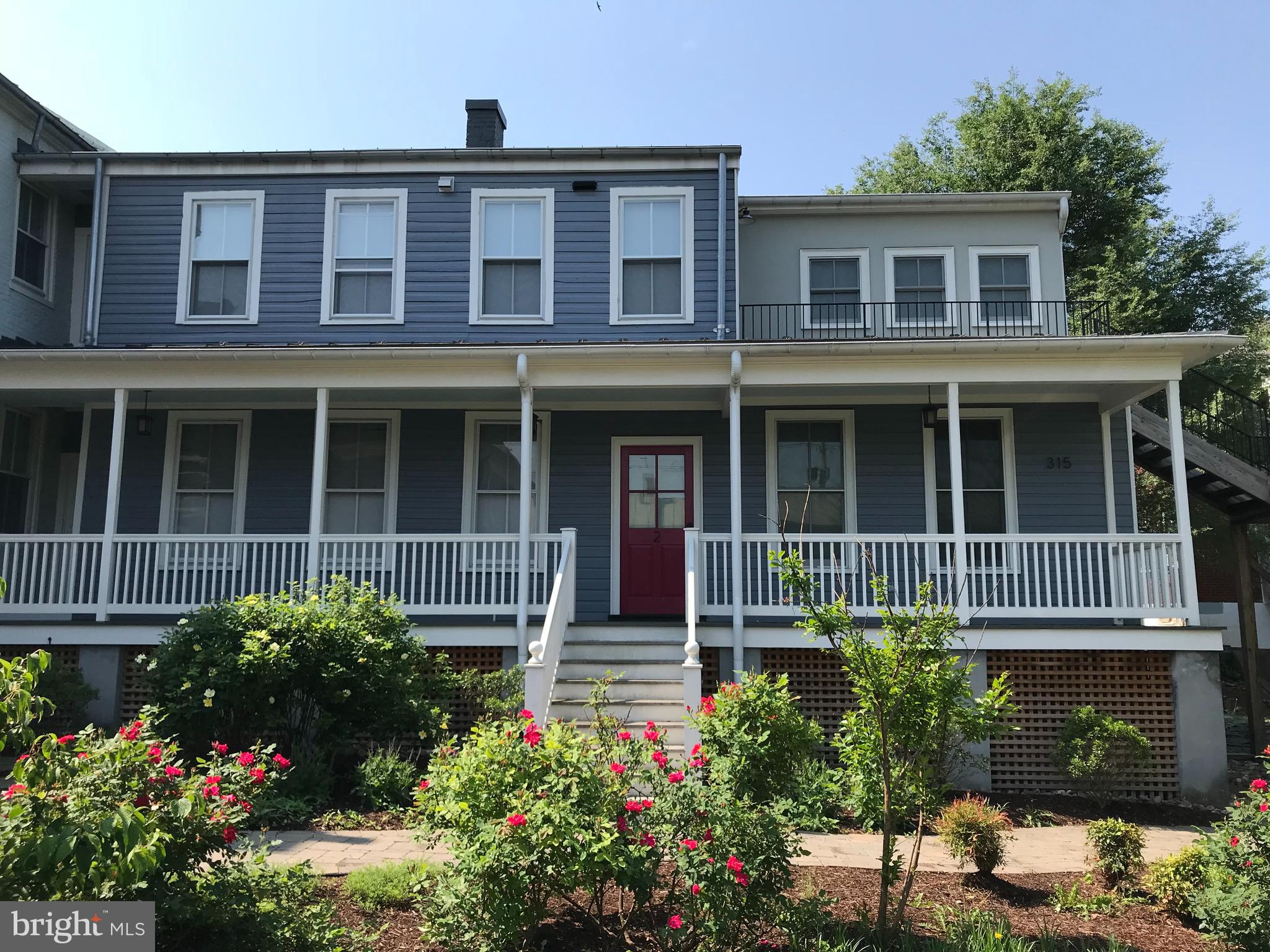 a house view with a garden space