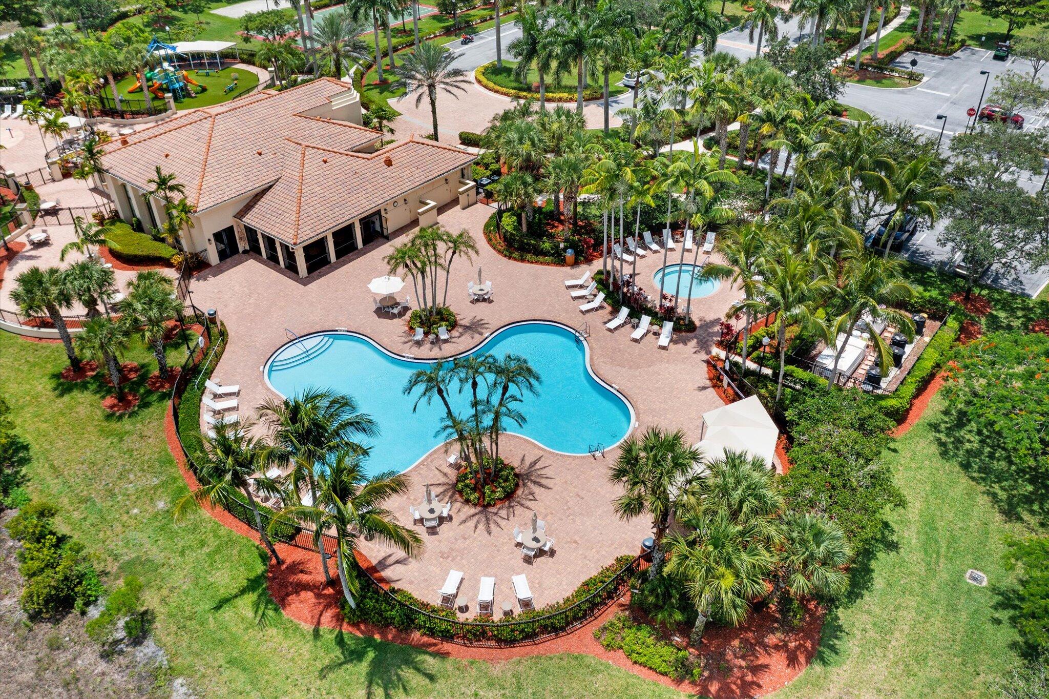 2930 Bellarosa Circle Royal Palm Beach, FL 33411 - Photo 30 of 36 an aerial view of residential houses with outdoor space