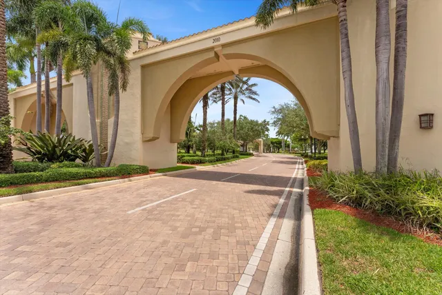 a view of a garden with a swimming pool