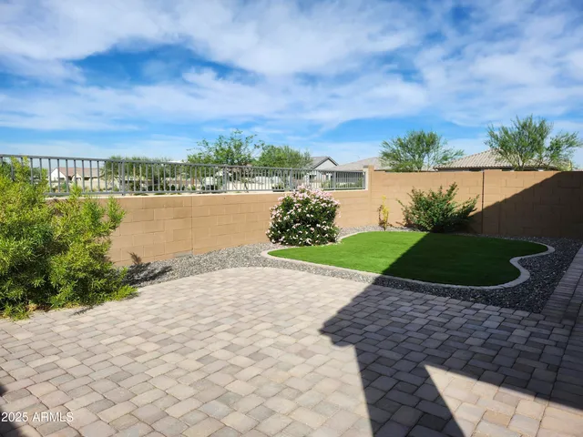 a view of a lake with a yard