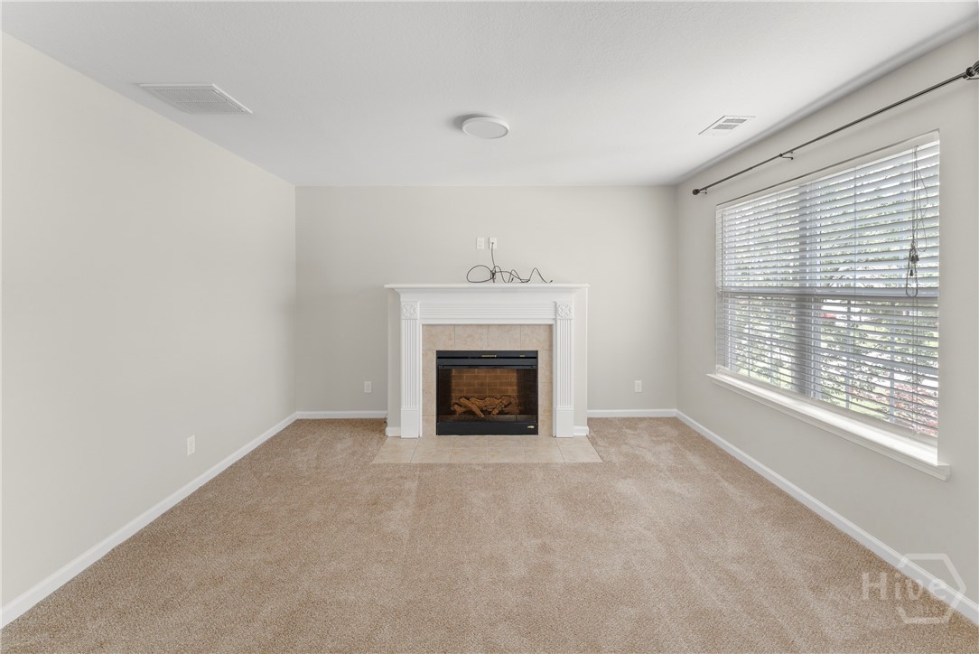 611 Dresler Road Rincon, GA 31326 - Photo 7 of 50 Primary sitting area w/fireplace
