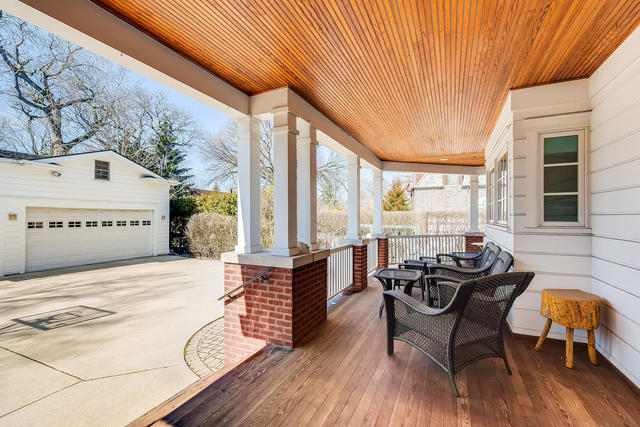 178 Nuttall Road Riverside, IL 60546 - Photo 40 of 49 a view of a patio with table and chairs with wooden floor and fence