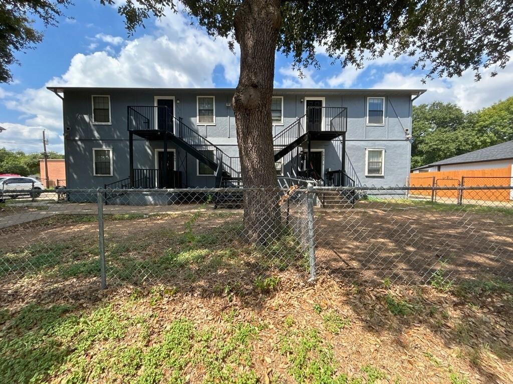 1615 Voirin Road Irving, TX 75061 - Photo 2 of 2 a front view of house with yard