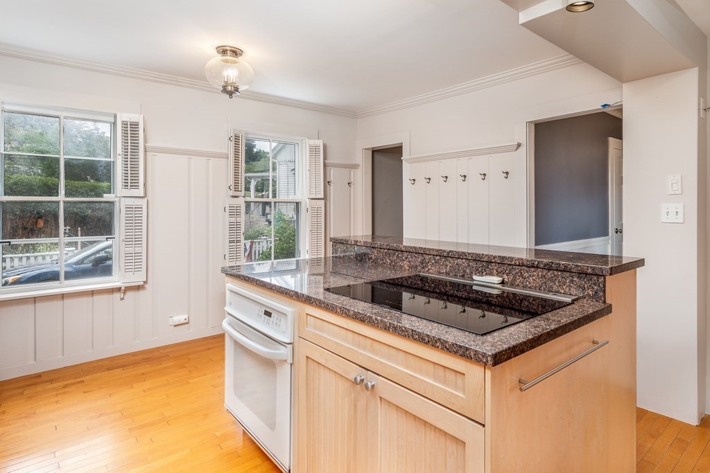 3 Lattimer Street Marblehead, MA 01945 - Photo 11 of 42 a kitchen with stainless steel appliances granite countertop a sink and a stove