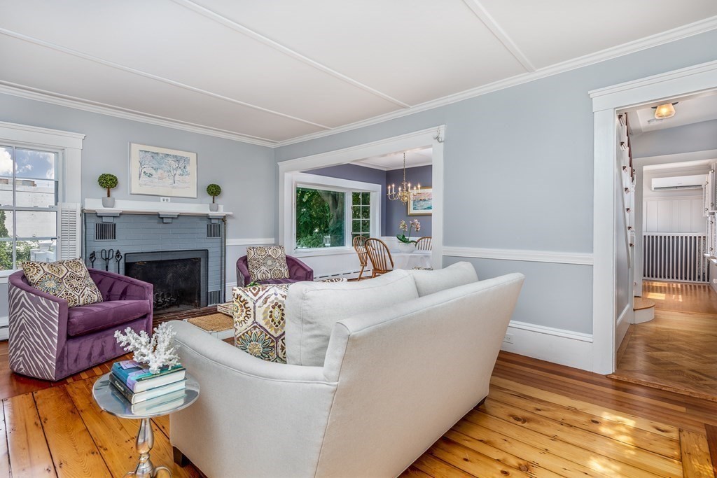 3 Lattimer Street Marblehead, MA 01945 - Photo 17 of 42 a living room with furniture and a fireplace