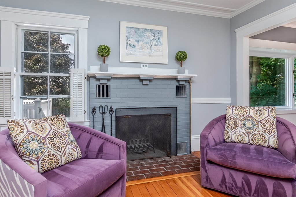 3 Lattimer Street Marblehead, MA 01945 - Photo 18 of 42 a living room with furniture and a fireplace
