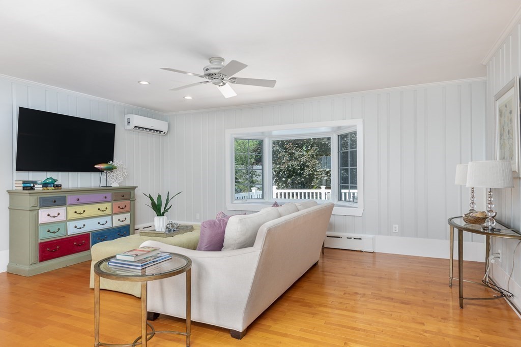 3 Lattimer Street Marblehead, MA 01945 - Photo 21 of 42 a living room with furniture and a flat screen tv