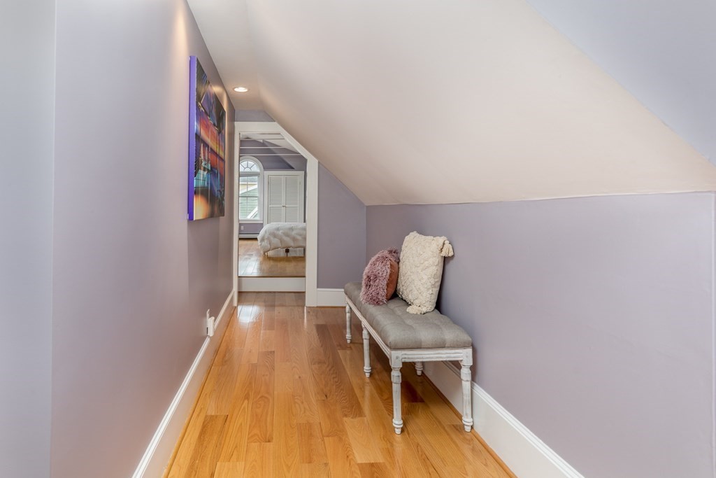 3 Lattimer Street Marblehead, MA 01945 - Photo 28 of 42 a hallway with wooden floor and furniture