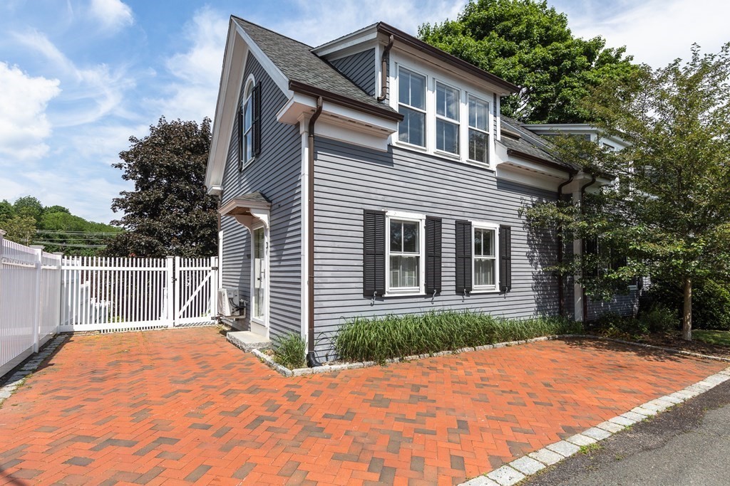 3 Lattimer Street Marblehead, MA 01945 - Photo 3 of 42 a house with trees in front of it