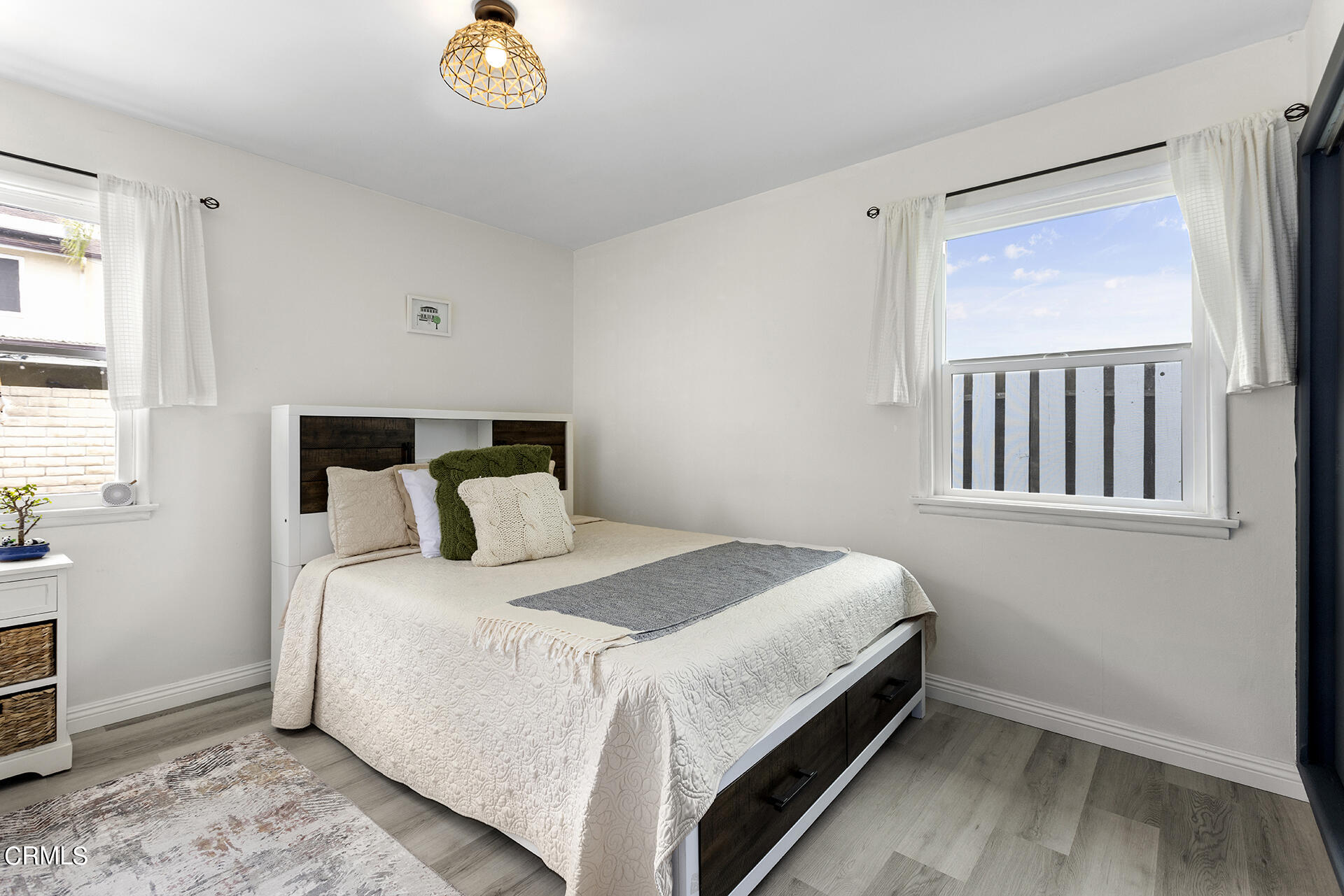 1130 Daveric Drive Pasadena, CA 91107 - Photo 13 of 21 a bedroom with a bed and a window