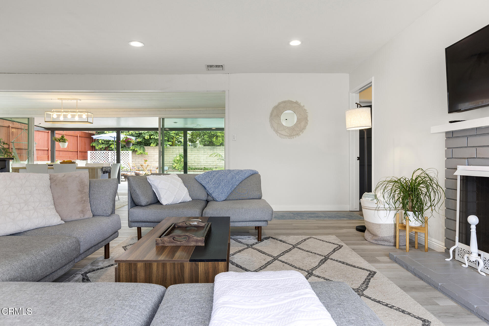 1130 Daveric Drive Pasadena, CA 91107 - Photo 5 of 21 a living room with furniture and a flat screen tv