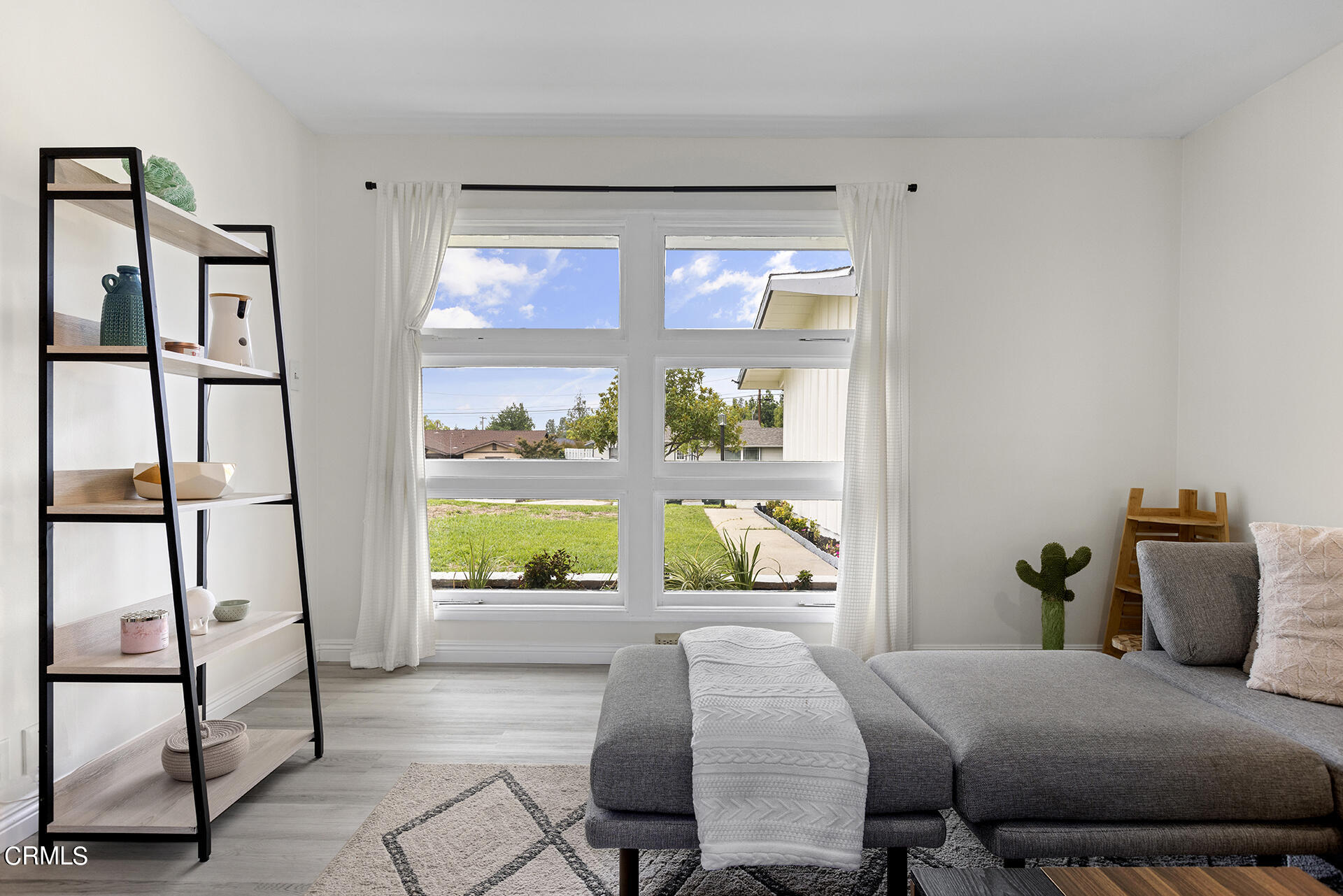 1130 Daveric Drive Pasadena, CA 91107 - Photo 6 of 21 a bedroom with a bed and window