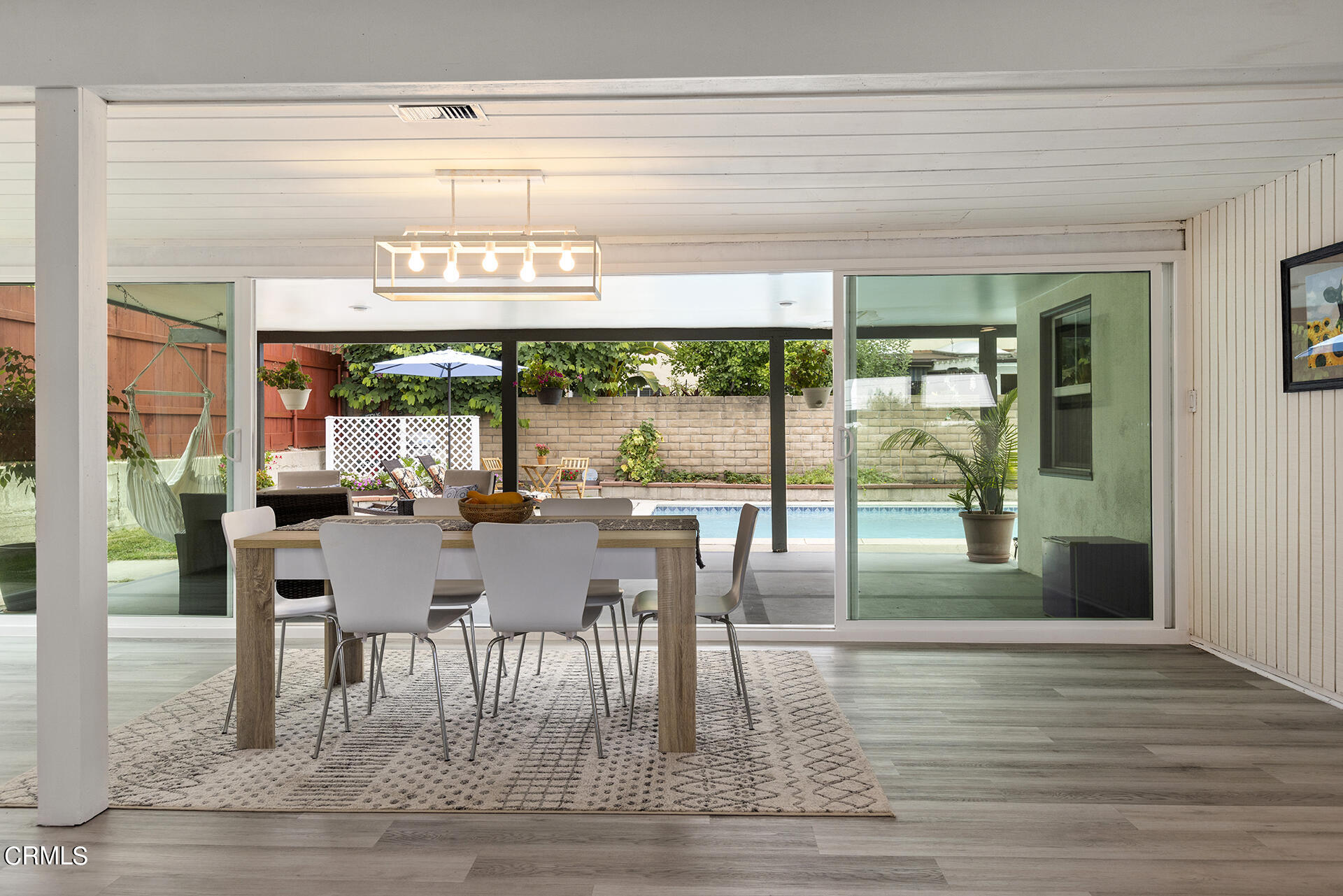 1130 Daveric Drive Pasadena, CA 91107 - Photo 7 of 21 a dinning table and chairs in a room