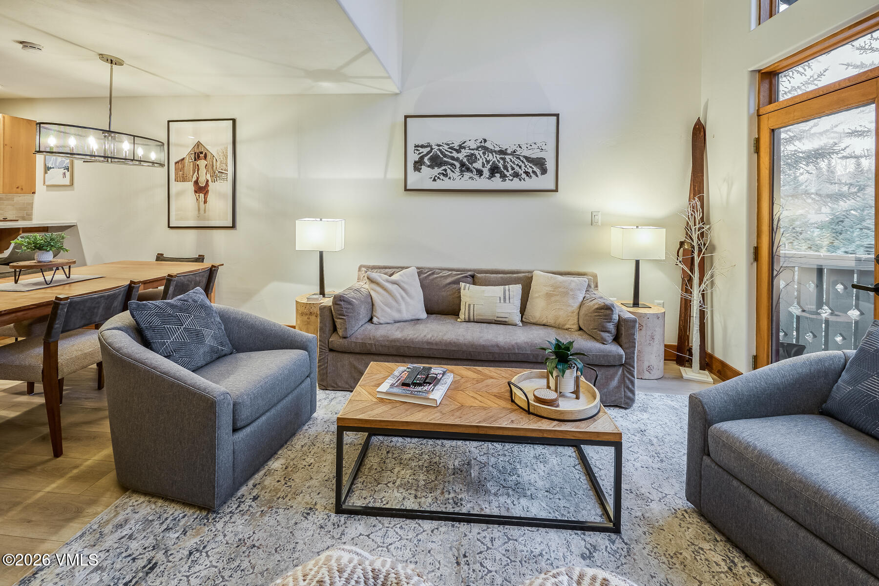 30 Cresta Road, Unit 306 Edwards, CO 81632 - Photo 8 of 26 a living room with furniture a rug and a table