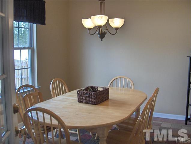 4501 Nightfall Court Durham, NC 27713 - Photo 5 of 11 a view of a dining room with furniture