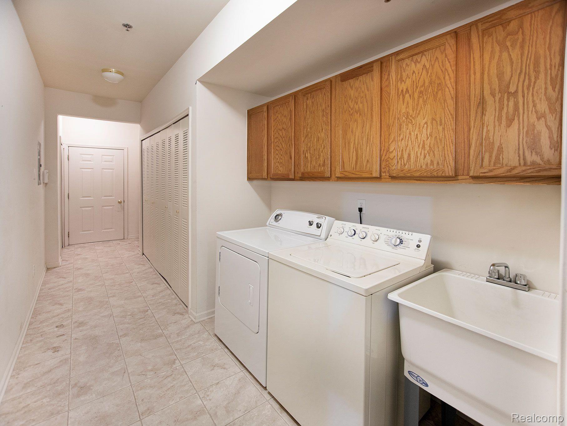 1722 Deepwood Circle Rochester, MI 48307 - Photo 11 of 21 Laundry Room and Storage