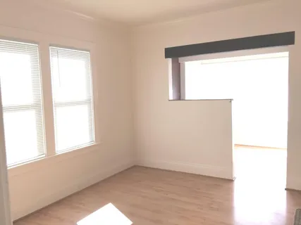 a bathroom with a sink and a window