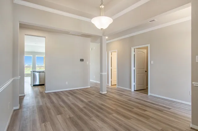 a view of livingroom with hardwood floor and a ceiling fan