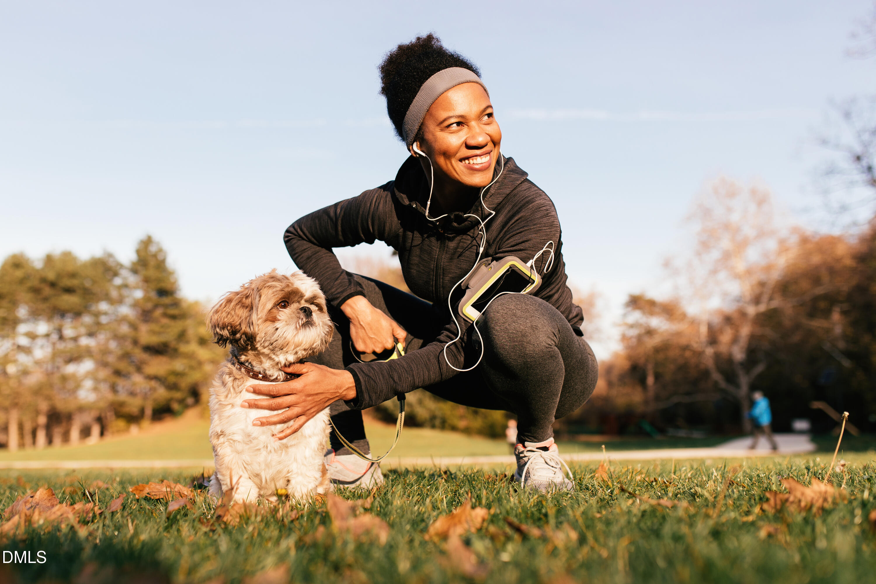 3205 Bomore Road Raleigh, NC 27610 - Photo 37 of 37 Woman with her dog in the park_Woman enj