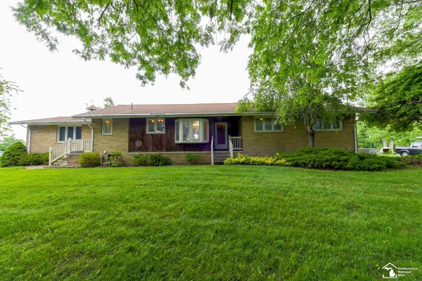 $405,000 | 33920 Huron River Drive, New Boston, MI 48164