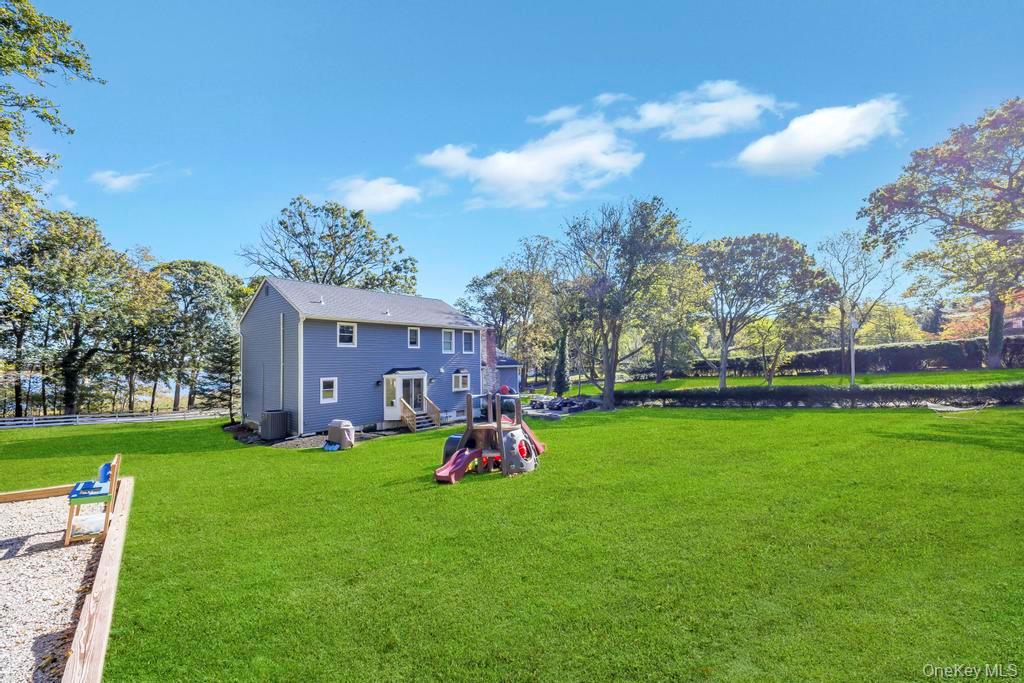 39 Bevin Road Northport, NY 11768 - Photo 7 of 44 View of green lawn