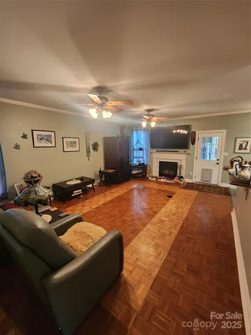 a room with lots of furniture and clutter