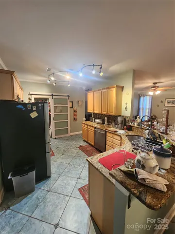 a view of staircase with a rug