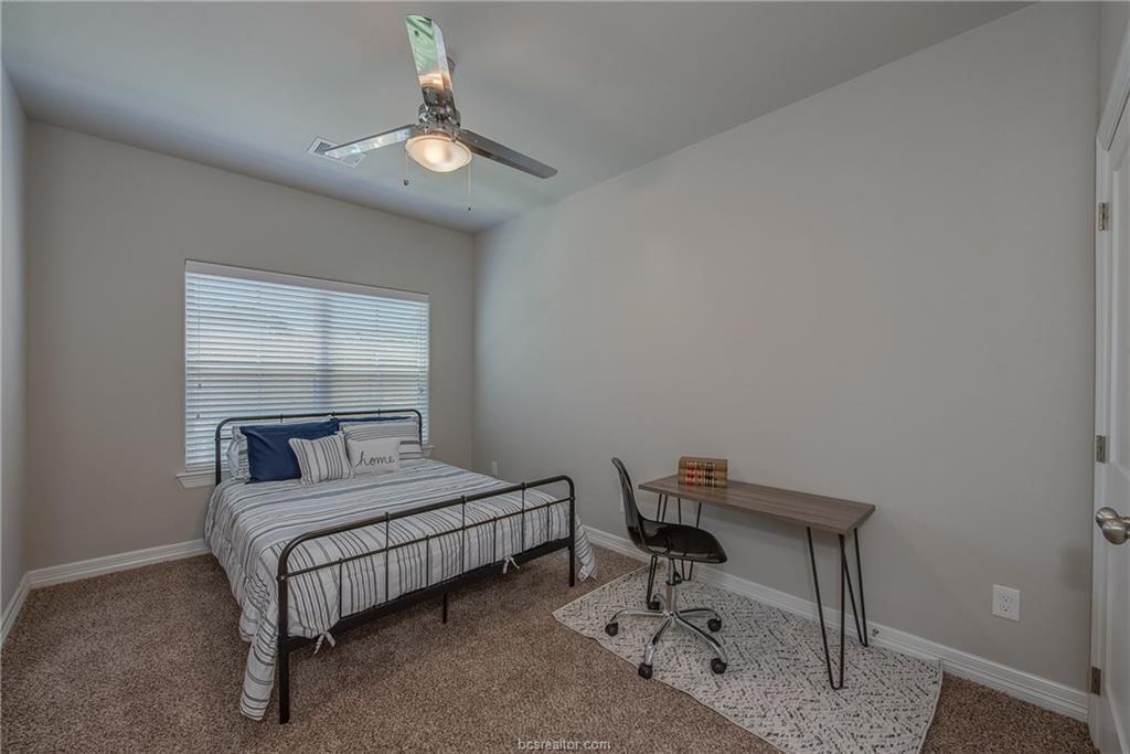 404 Poplar Street, Unit A College Station, TX 77840 - Photo 11 of 20 a bedroom with a bed chair and a window
