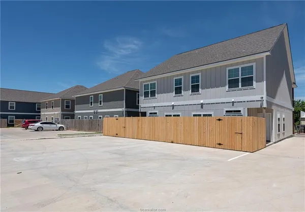 a view of a house with swimming pool