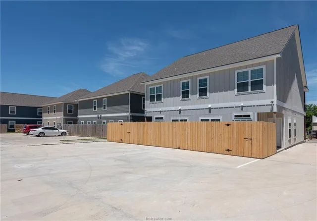 a view of a house with swimming pool