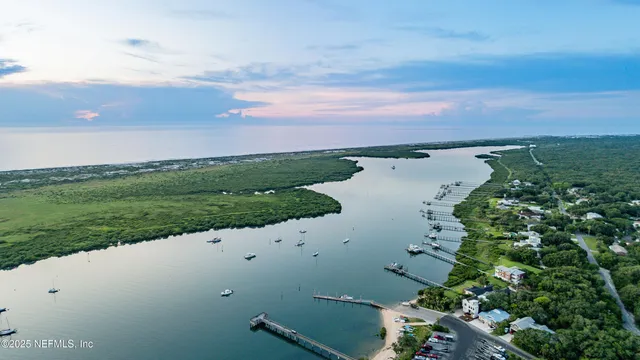 an aerial view of beach and city