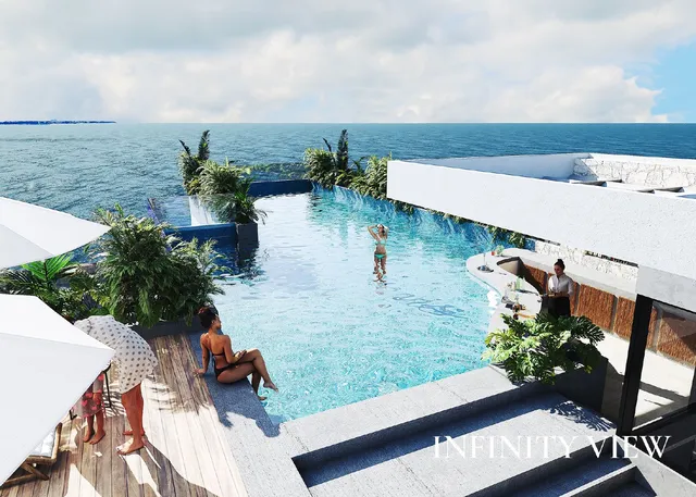 an aerial view of a house with yard and lake view