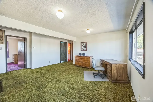 a room with furniture and a window