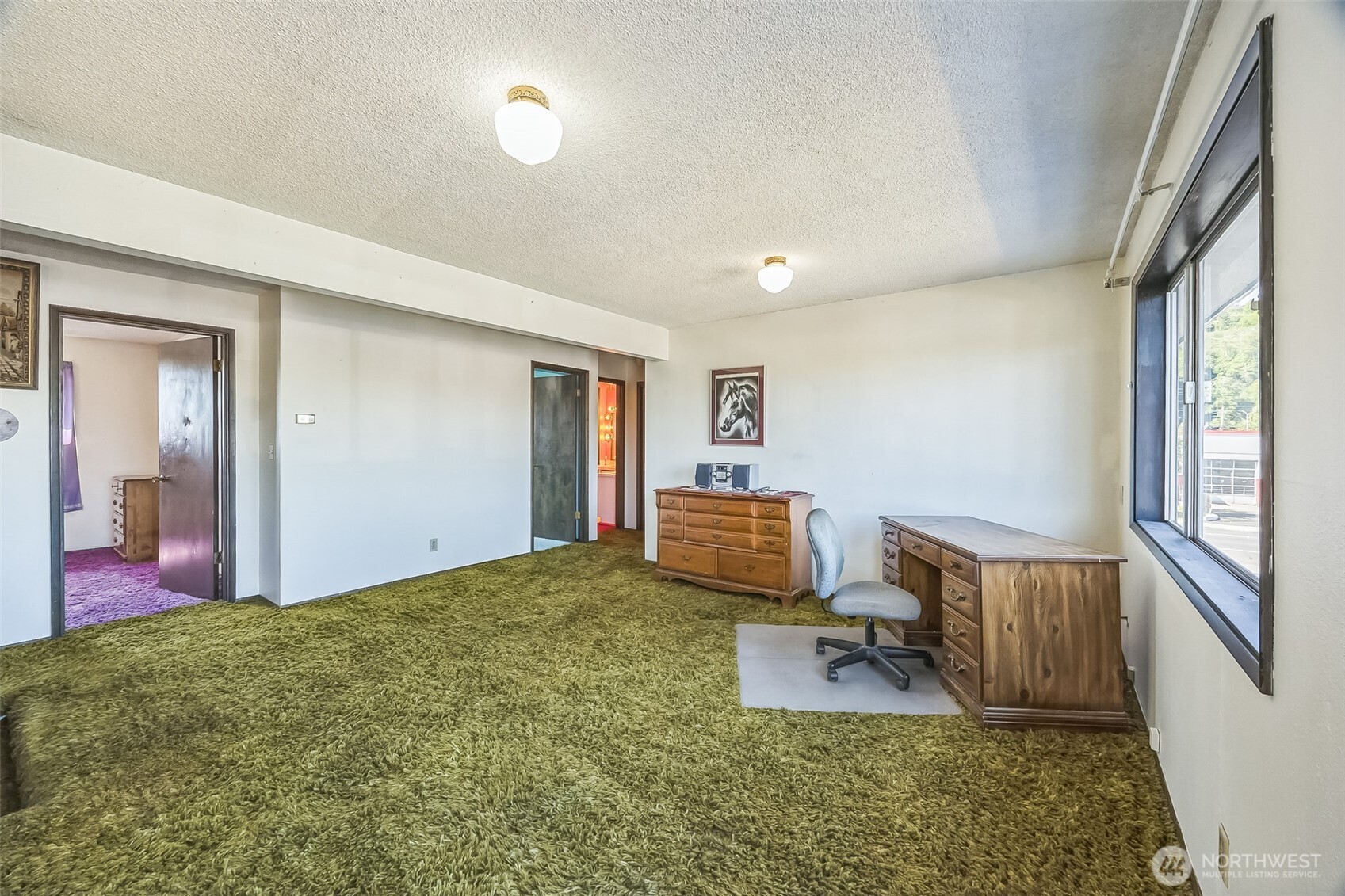 2420 Simpson Avenue Hoquiam, WA 98550 - Photo 13 of 32 a room with furniture and a window
