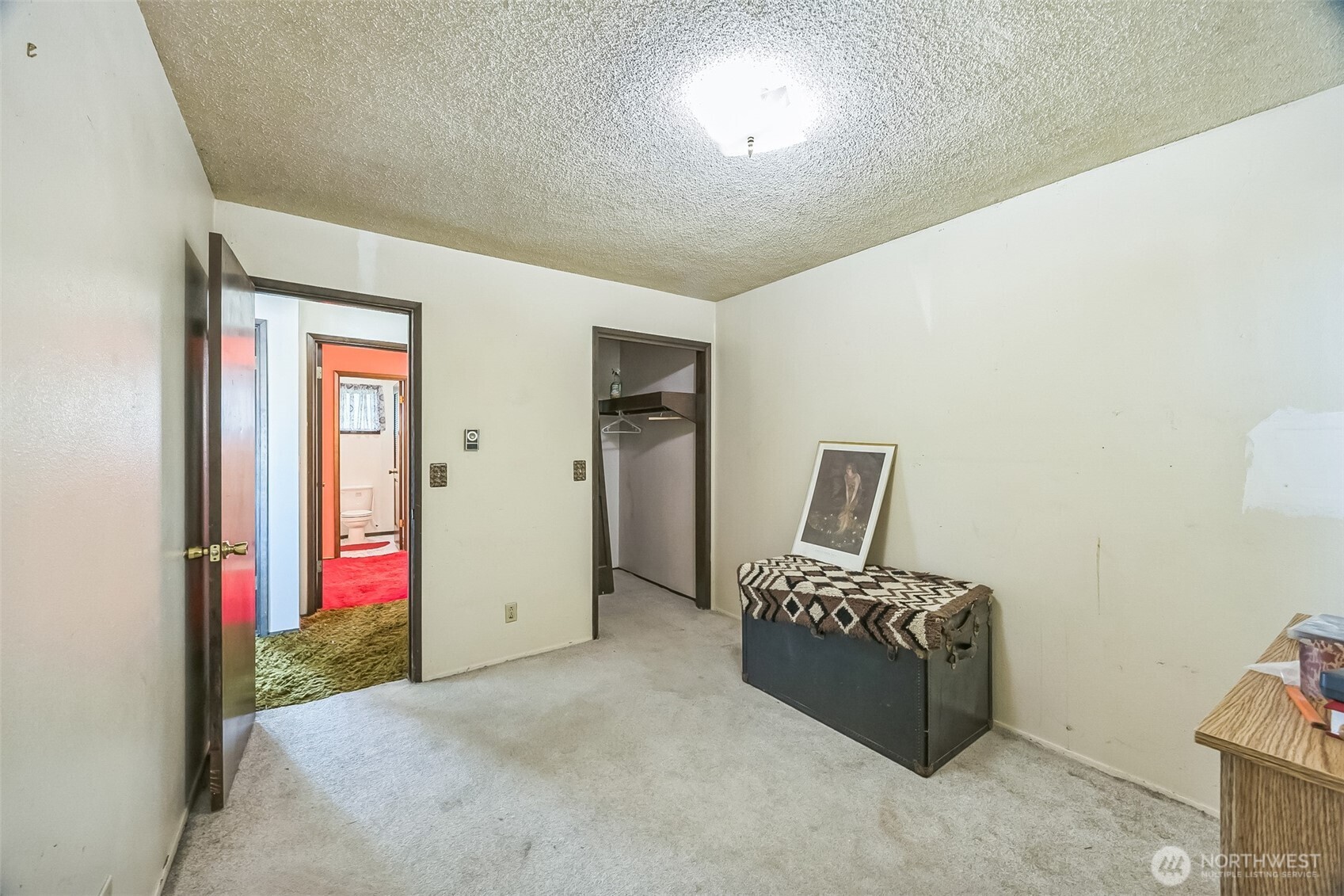 2420 Simpson Avenue Hoquiam, WA 98550 - Photo 19 of 32 a bedroom with a bed and a couch