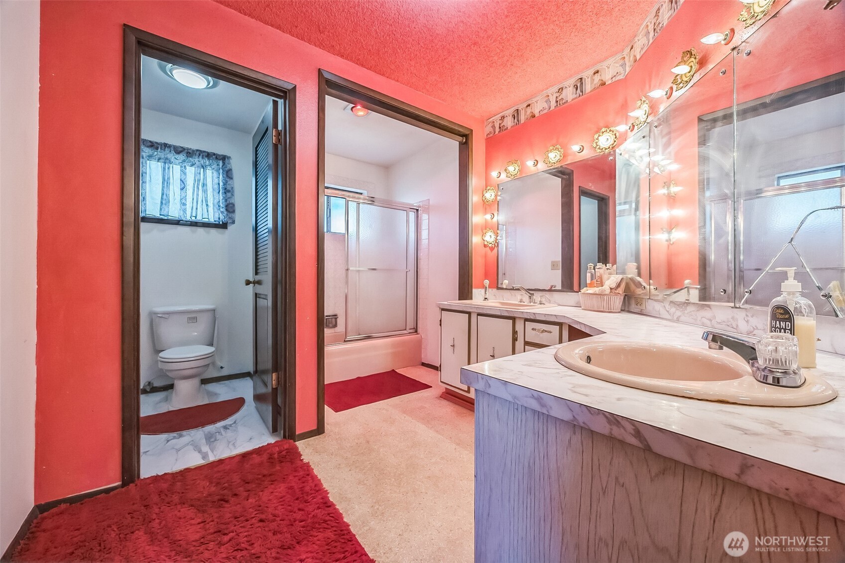 2420 Simpson Avenue Hoquiam, WA 98550 - Photo 20 of 32 a en suite bathroom with a sink double vanity and a mirror