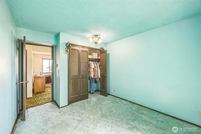 a view of a room with an entryway