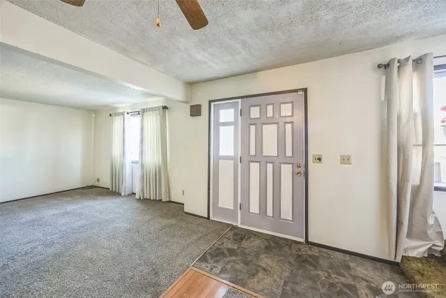 an empty room with windows