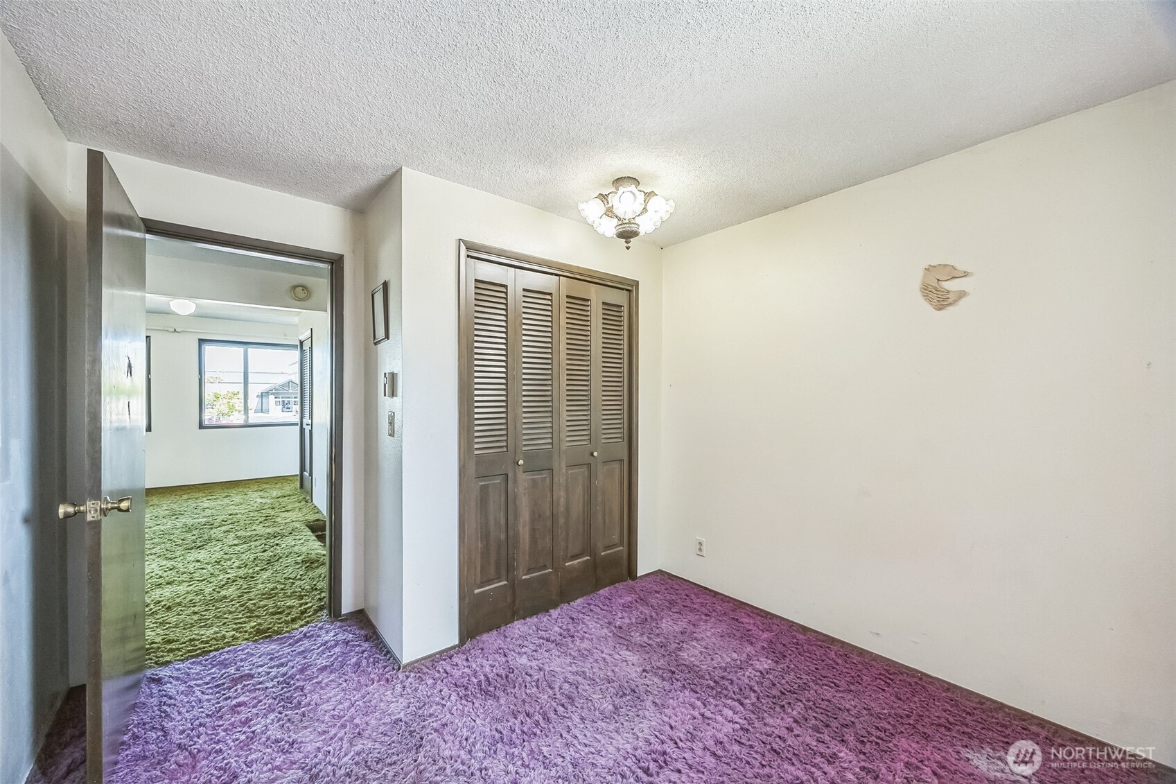2420 Simpson Avenue Hoquiam, WA 98550 - Photo 4 of 32 an empty room with windows and closet