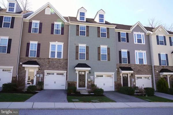 a front view of a multi story residential apartment building