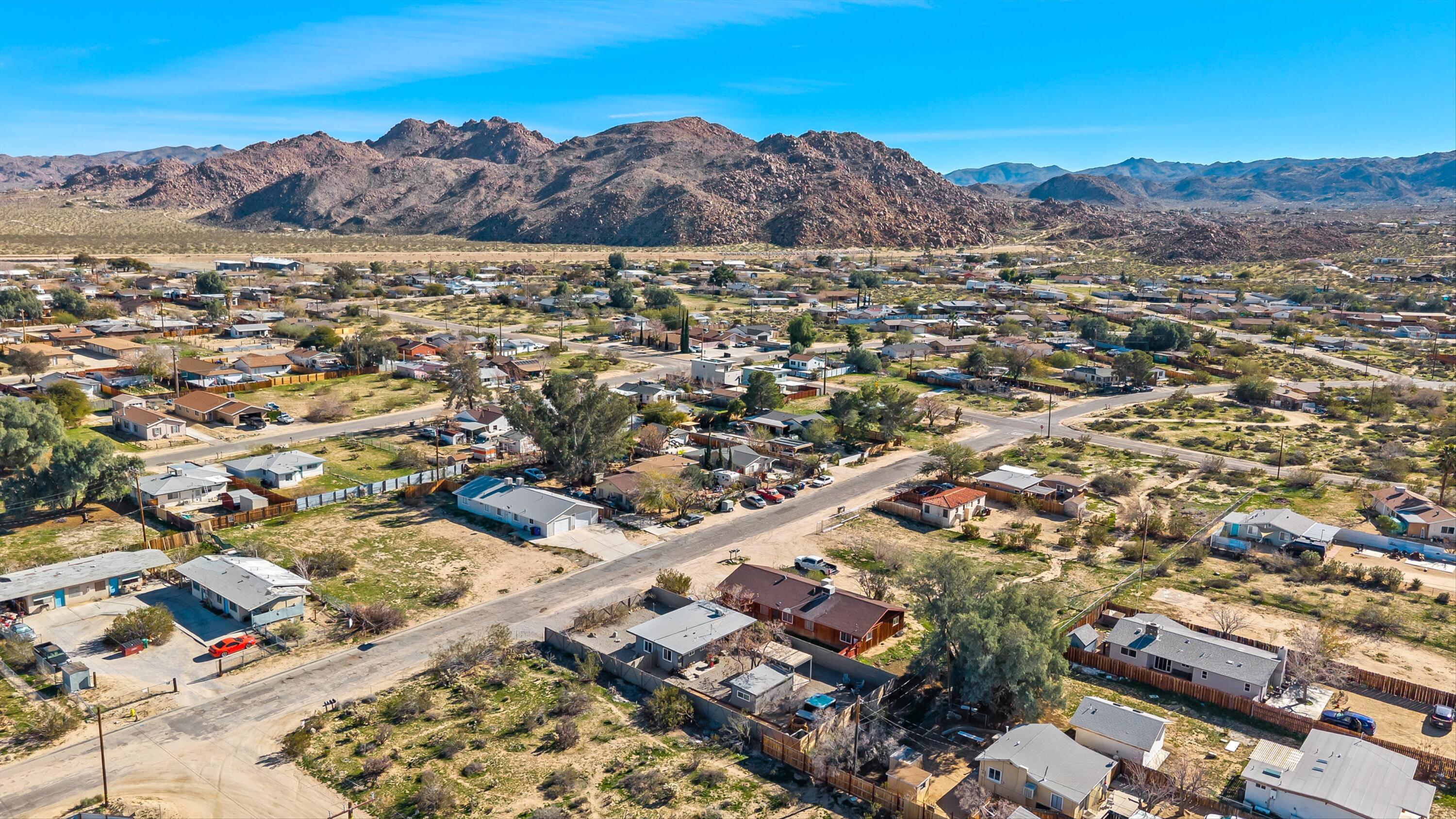 62010 El Reposo Circle Joshua Tree, CA 92252 - Photo 28 of 28 an aerial view of residential houses and outdoor space