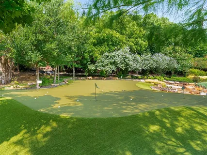 a view of a swimming pool and an outdoor space