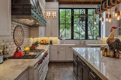a kitchen with granite countertop lots of counter top space