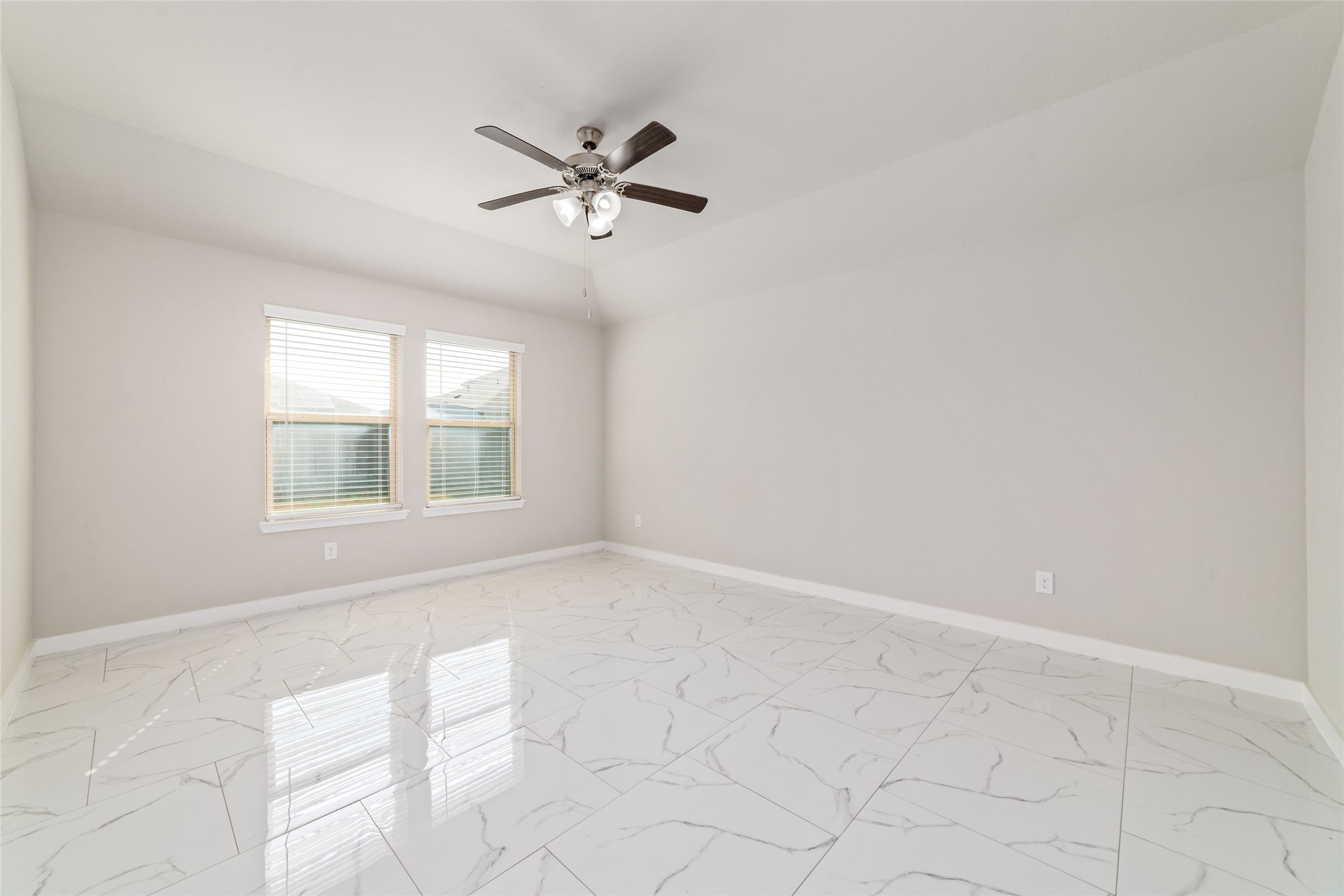 5502 Creekside Ridge Trail Katy, TX 77449 - Photo 18 of 25 a view of an empty room with a window