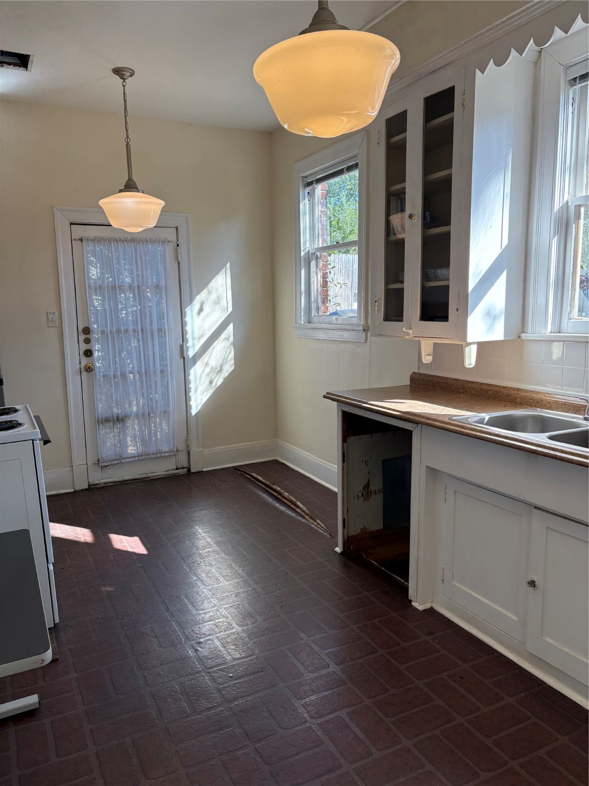 2444 Broadway Beaumont, TX 77702 - Photo 12 of 23 a view of a room with a window and wooden floor
