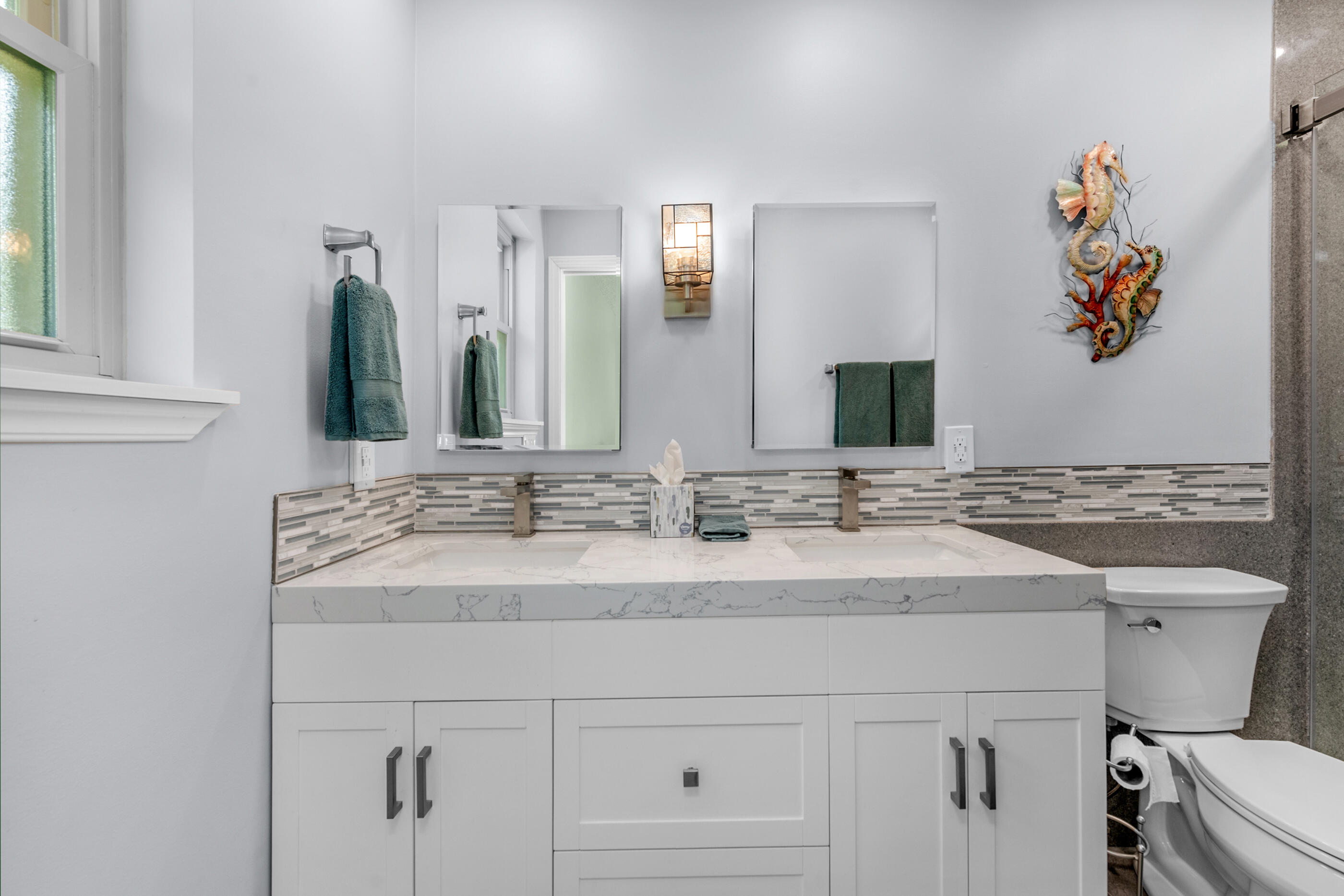 10099 Bellbrook Road Milton, FL 32583 - Photo 25 of 49 a bathroom with a sink and a toilet