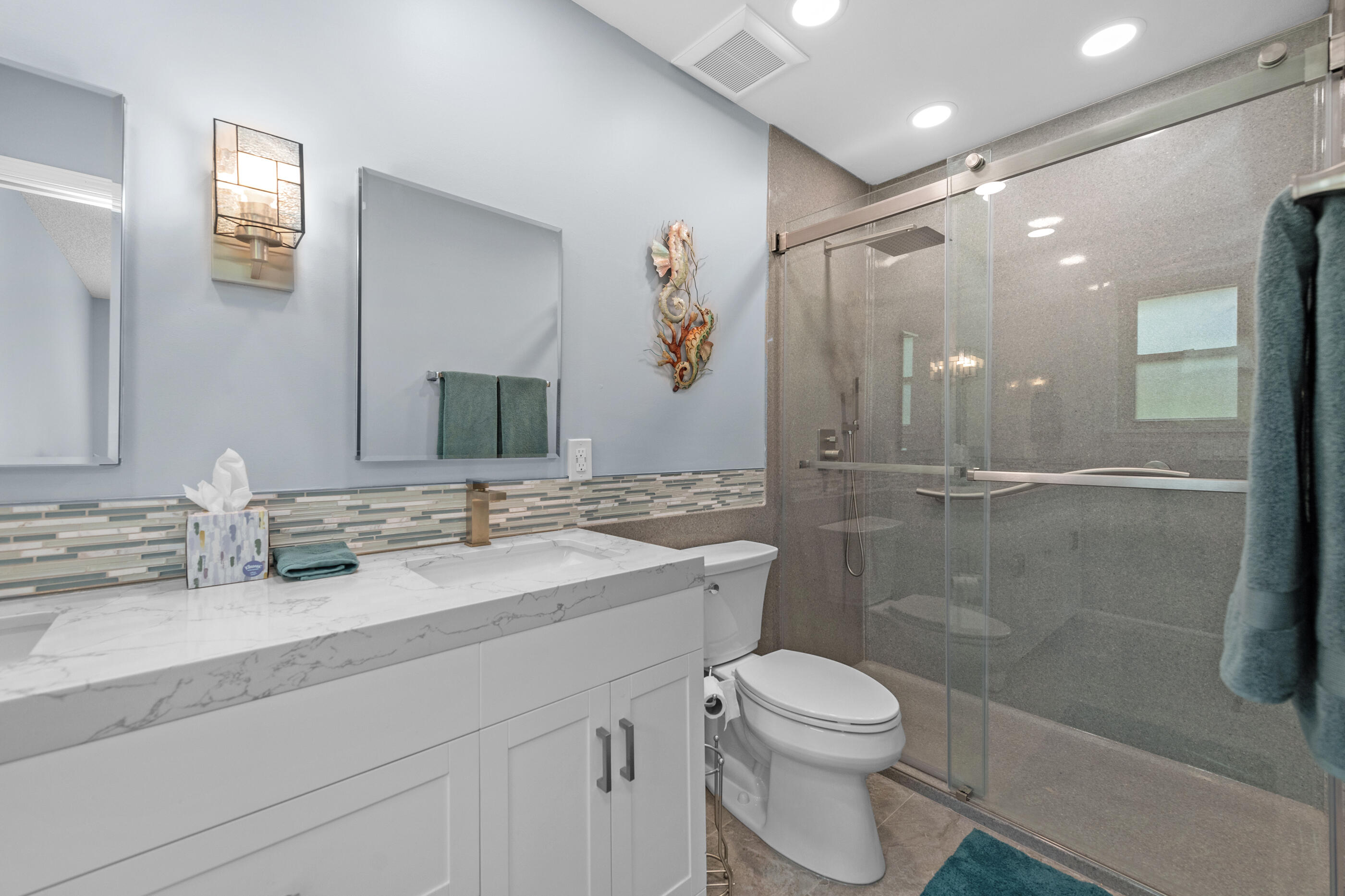 10099 Bellbrook Road Milton, FL 32583 - Photo 26 of 49 a bathroom with a sink a toilet and shower