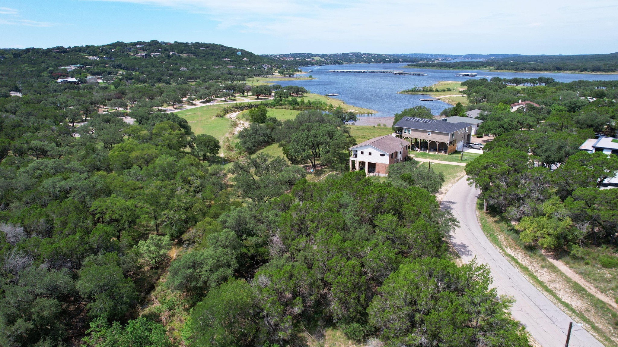 6719 Bar K Ranch Road Lago Vista, TX 78645 - Photo 3 of 36 an aerial view of multiple house
