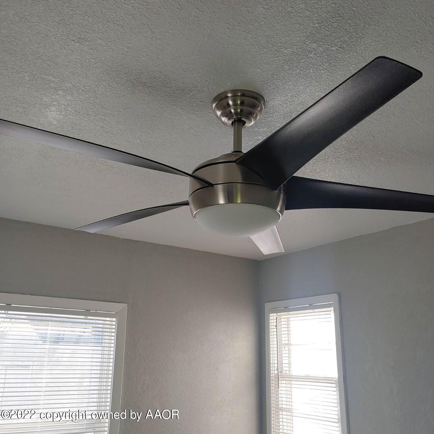 4304 South Hayden Street Amarillo, TX 79110 - Photo 12 of 22 a view of a room that has a window and a ceiling fan