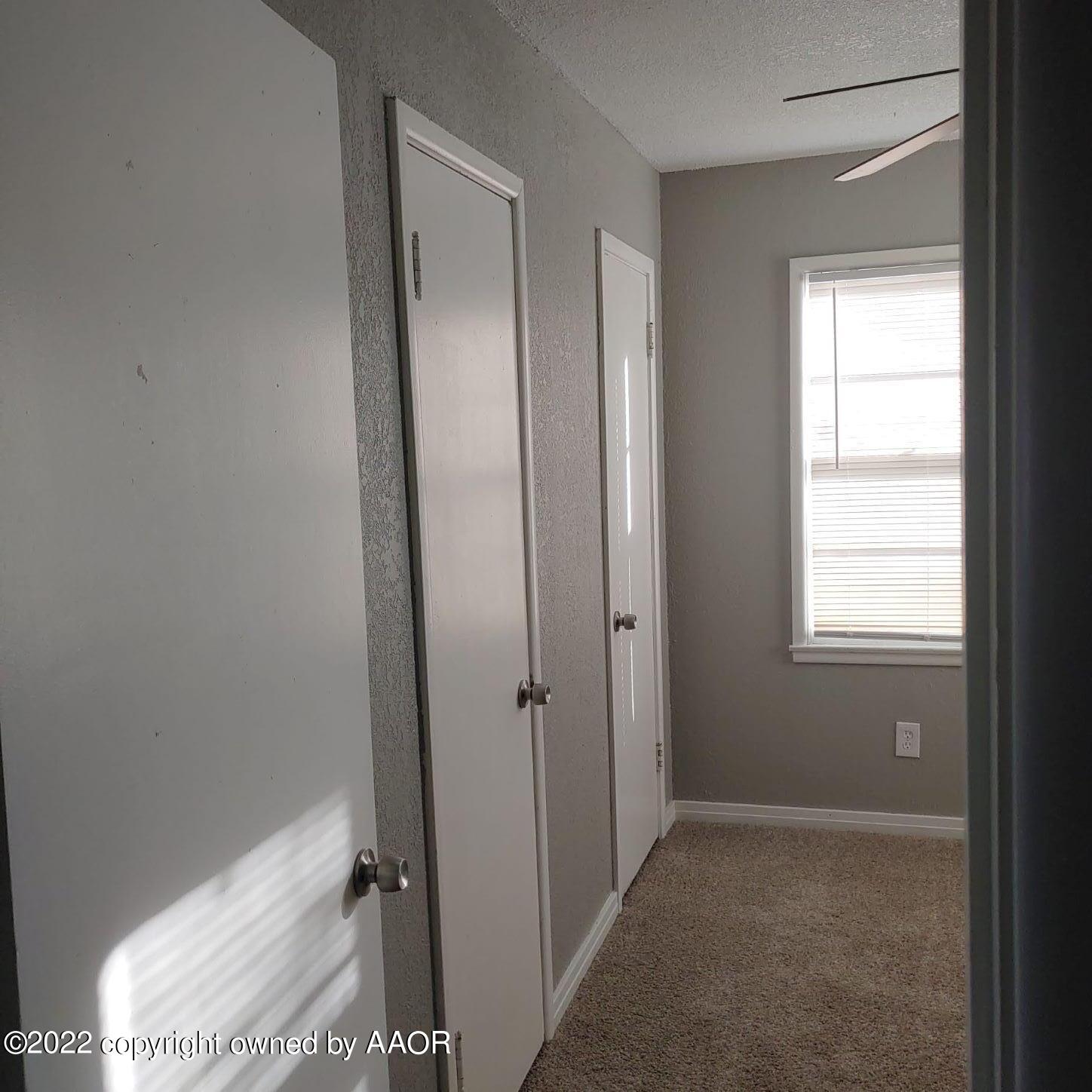 4304 South Hayden Street Amarillo, TX 79110 - Photo 16 of 22 an empty room with windows